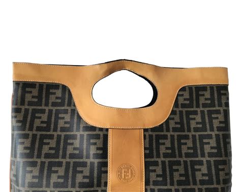 fendi zucca fold over clutch